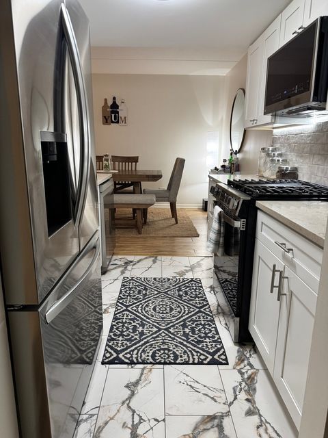 Tiny photo for 8200 Woodglen Lane #107, Downers Grove, IL 60516 (MLS # 12570152)