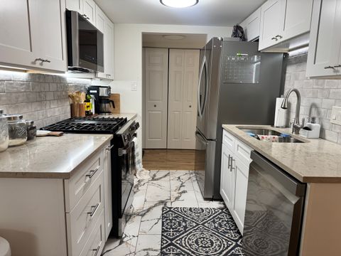 Tiny photo for 8200 Woodglen Lane #107, Downers Grove, IL 60516 (MLS # 12570152)