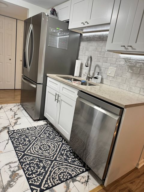 Tiny photo for 8200 Woodglen Lane #107, Downers Grove, IL 60516 (MLS # 12570152)