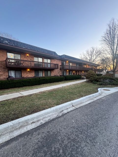 Photo of 8200 Woodglen Lane #107, Downers Grove, IL 60516 (MLS # 12570152)