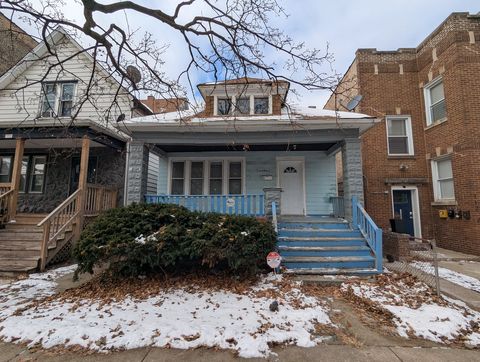 Photo of 11246 S Indiana Avenue, Chicago, IL 60628 (MLS # 12558988)