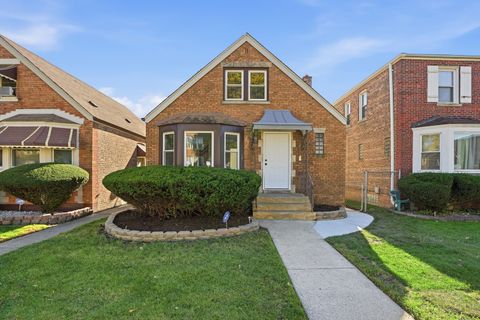 Photo of 607 E 103rd Place, Chicago, IL 60628 (MLS # 12541008)