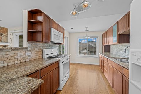 Tiny photo for 1662 COMMODORE Court #4, Schaumburg, IL 60193 (MLS # 12456220)