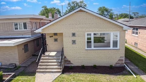 Photo of 1651 E 91st Street, Chicago, IL 60617 (MLS # 12669132)