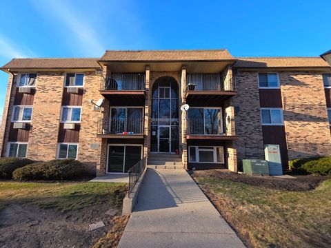 Photo of 1045 Higgins Quarters Drive #4-101, Hoffman Estates, IL 60169 (MLS # 12590131)