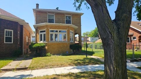 Photo of 7718 S Bennett Avenue, Chicago, IL 60649 (MLS # 12639542)