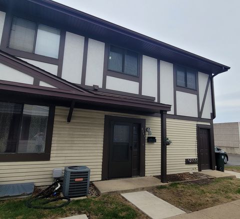 Photo of 6084 Fremont Drive #6084, Hanover Park, IL 60133 (MLS # 12531920)