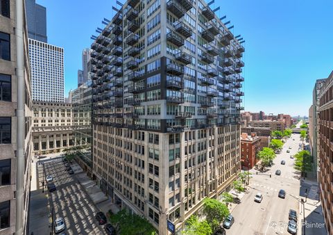 Photo of 565 W Quincy Street #704, Chicago, IL 60661 (MLS # 12661534)