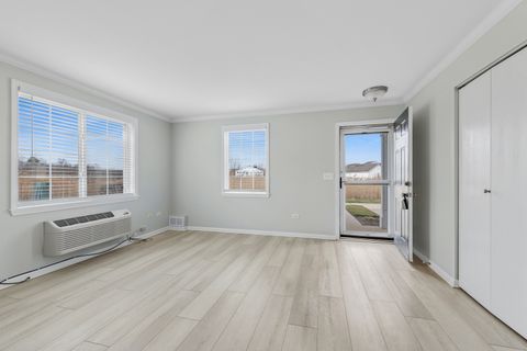 Tiny photo for 1009 Silverstone Drive #1009, Carpentersville, IL 60110 (MLS # 12597909)