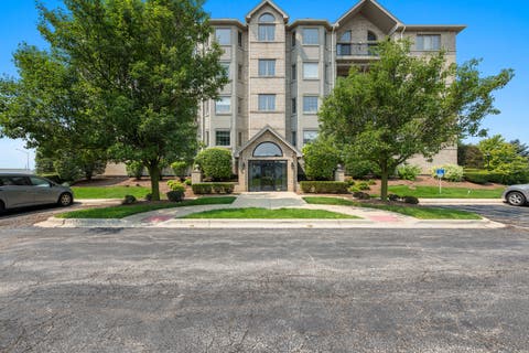 Photo of 8515 Woodward Avenue #303, Woodridge, IL 60517 (MLS # 12719066)