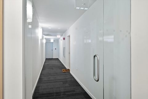 Tiny photo for 9725 Woods Drive #309, Skokie, IL 60077 (MLS # 12562249)