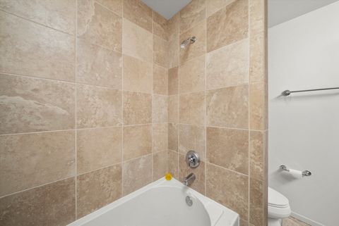 Tiny photo for 9725 Woods Drive #309, Skokie, IL 60077 (MLS # 12562249)