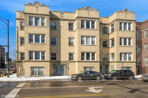 Photo of 102 N Hamlin Boulevard #D1, Chicago, IL 60624 (MLS # 12575122)