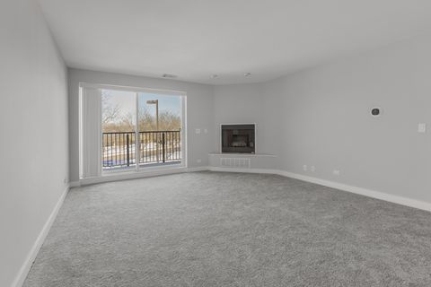 Tiny photo for 815 Leicester Road #211, Elk Grove Village, IL 60007 (MLS # 12477907)