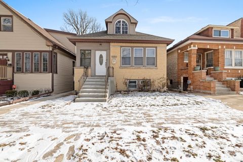 Photo of 2207 N Nagle Avenue, Chicago, IL 60707 (MLS # 12590998)