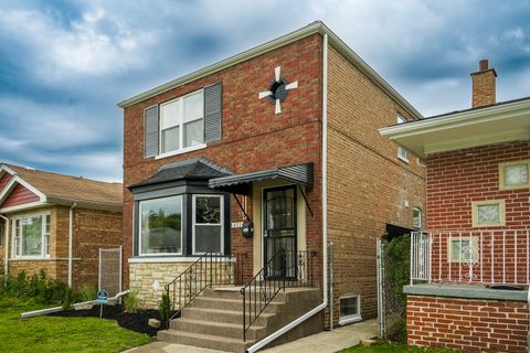 Photo of 452 W 104th Street, Chicago, IL 60628 (MLS # 12686036)