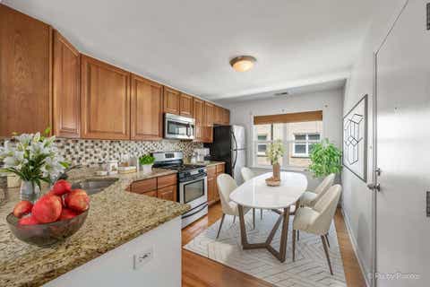 Tiny photo for 6421 N Damen Avenue #2W, Chicago, IL 60645 (MLS # 12717370)