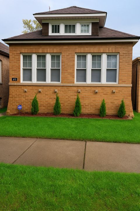 Photo of 602 E 88th Place, Chicago, IL 60619 (MLS # 12497860)