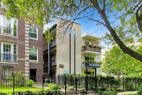 Photo of 1125 W Lunt Avenue #203, Chicago, IL 60626 (MLS # 12660826)