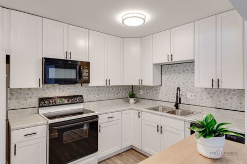 Tiny photo for 800 Brook Drive #1, Streamwood, IL 60107 (MLS # 12553624)