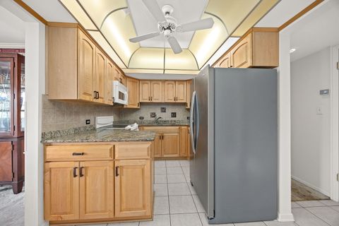 Tiny photo for 120 Carriage Way Drive #B101, Burr Ridge, IL 60527 (MLS # 12618755)