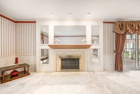 Tiny photo for 120 Carriage Way Drive #B101, Burr Ridge, IL 60527 (MLS # 12618755)