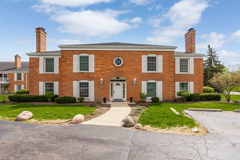 Photo of 120 Carriage Way Drive #B101, Burr Ridge, IL 60527 (MLS # 12618755)