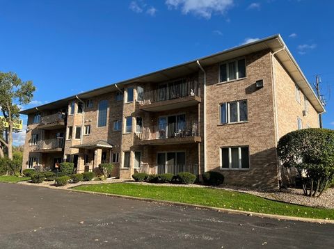 Photo of 10228 Southwest Highway #1C, Chicago Ridge, IL 60415 (MLS # 12491190)