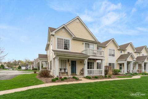 Photo of 649 Lincoln Station Drive #1302, Oswego, IL 60543 (MLS # 12618692)