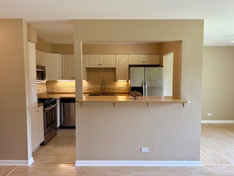 Tiny photo for 6S010 Steeple Run Drive #2D, Naperville, IL 60540 (MLS # 12580019)