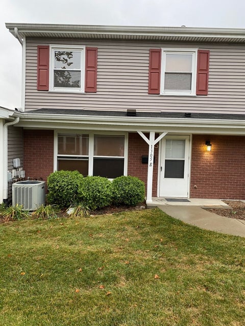 Photo of 1305 Kingsbury Drive #E, Hanover Park, IL 60133 (MLS # 12685038)