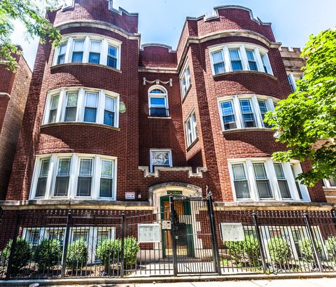 Photo of 7020 S PAXTON Avenue #1S, Chicago, IL 60649 (MLS # 12574364)
