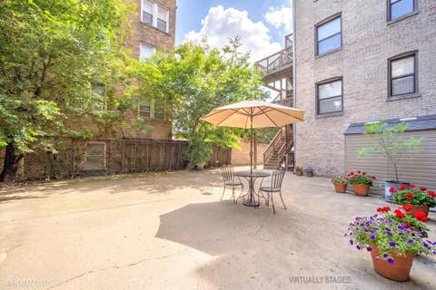 Tiny photo for 6254 N Bell Avenue #T, Chicago, IL 60659 (MLS # 12680342)