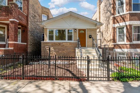 Photo of 932 N Ridgeway Avenue, Chicago, IL 60651 (MLS # 12623626)