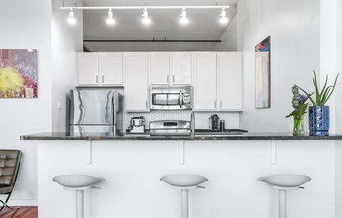 Tiny photo for 1224 W VAN BUREN Avenue #822, Chicago, IL 60607 (MLS # 12631334)