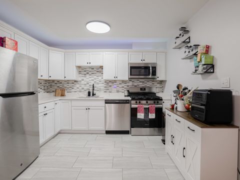 Tiny photo for 400 Country Lane, Streamwood, IL 60107 (MLS # 12585076)