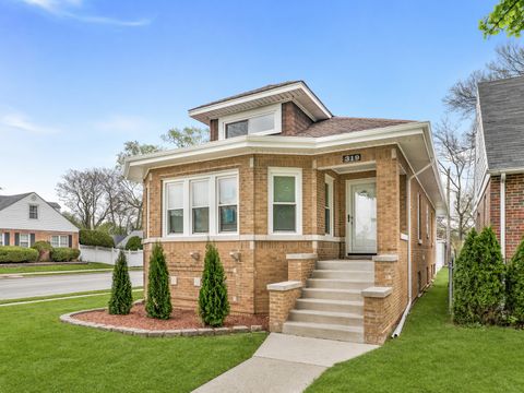Photo of 319 Bellwood Avenue, Bellwood, IL 60104 (MLS # 12617661)