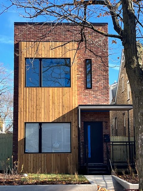 Photo of 905 N Saint Louis Avenue, Chicago, IL 60651 (MLS # 12475667)