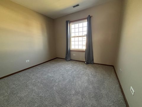 Tiny photo for 615 Mallard Court #C2, Bartlett, IL 60103 (MLS # 12590201)