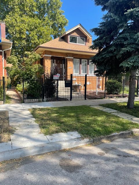 Photo of 7715 S Oglesby Avenue, Chicago, IL 60649 (MLS # 12487188)