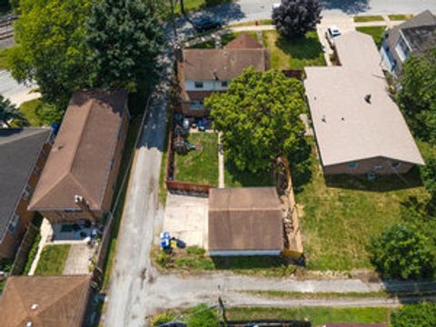 Tiny photo for 12757 Mozart Street, Blue Island, IL 60406 (MLS # 12626929)