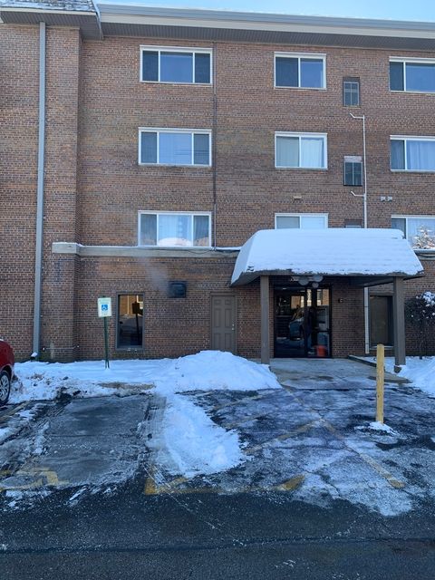 Photo of 2301 Beau Monde Lane #104, Lisle, IL 60532 (MLS # 12526879)