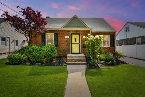 Photo of 592 Winthrop Avenue, Bellmore, NY 11710 (MLS # 12717448)