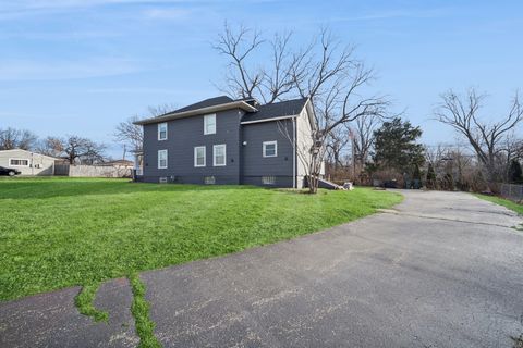 Tiny photo for 9 Center Road, Streamwood, IL 60107 (MLS # 12570917)