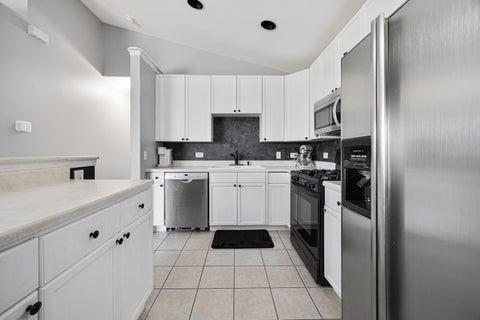 Tiny photo for 1002 Castleshire Drive, Woodstock, IL 60098 (MLS # 12763381)