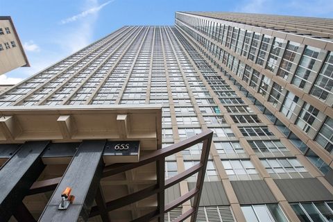 Photo of 655 W Irving Park Road #303, Chicago, IL 60613 (MLS # 12595772)