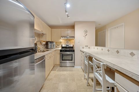 Tiny photo for 815 Leicester Road #114A, Elk Grove Village, IL 60007 (MLS # 12603543)