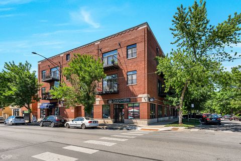 Photo of 2934 W Montrose Avenue #303, Chicago, IL 60618 (MLS # 12631666)