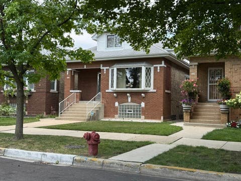 Photo of 5330 W Melrose Street, Chicago, IL 60641 (MLS # 12712573)