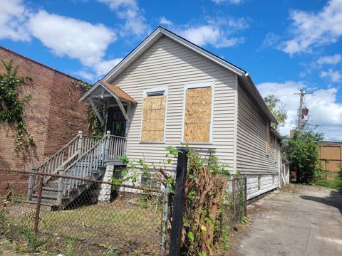 Photo of 1412 E 75th Street, Chicago, IL 60619 (MLS # 12457376)